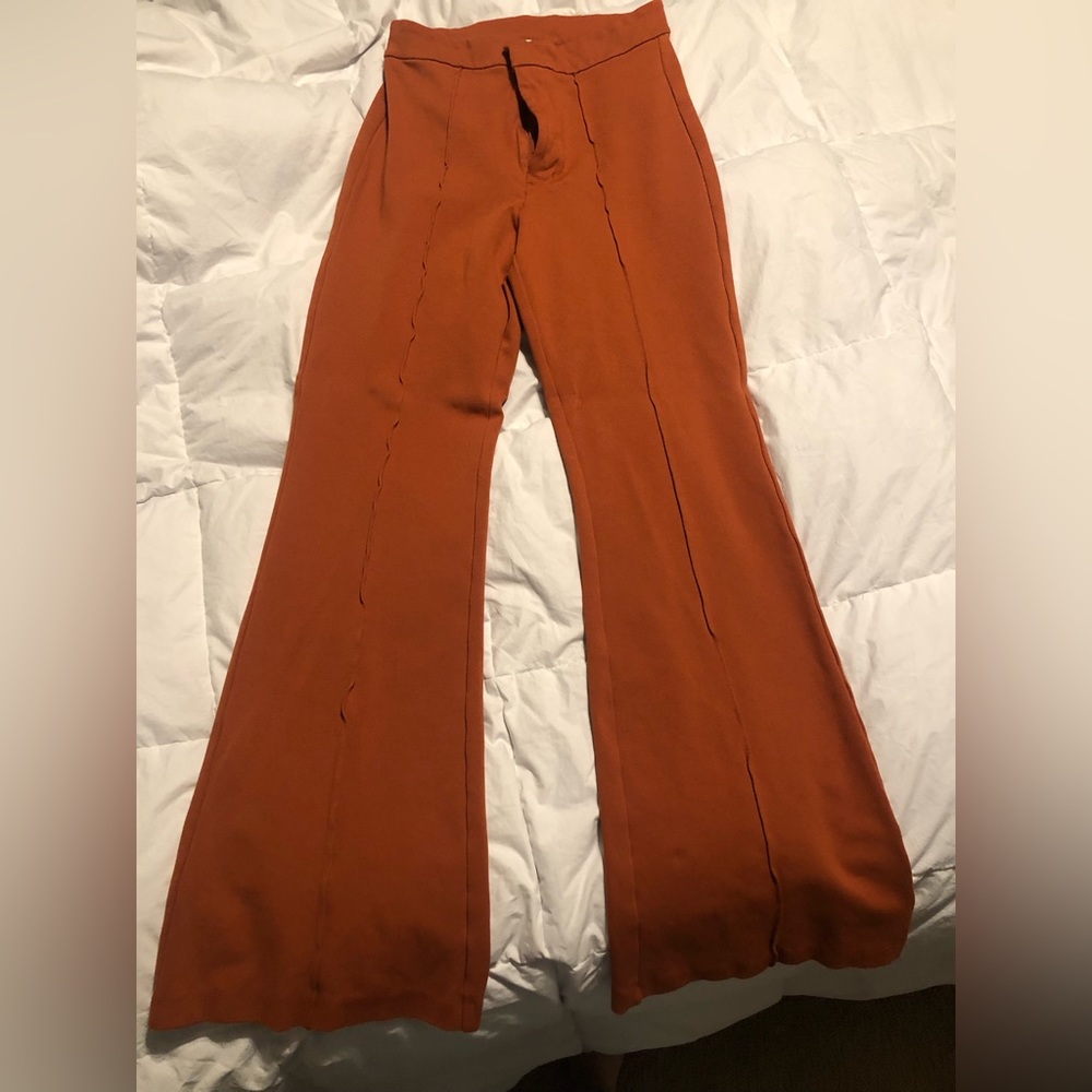 A new day flare dress pants. Burnt orange. Size 10. Never worn.